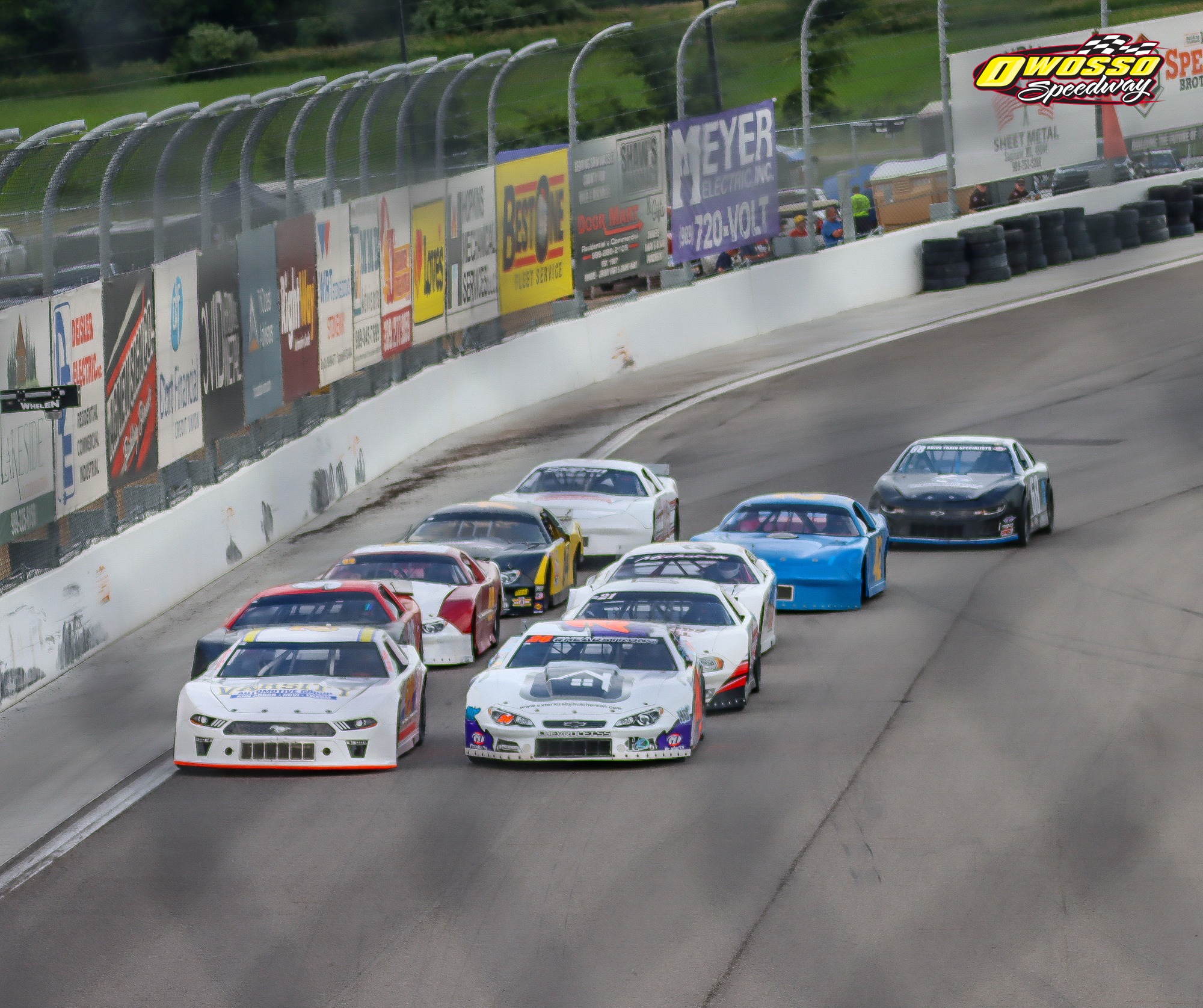 Number 22 leading the field through a turn